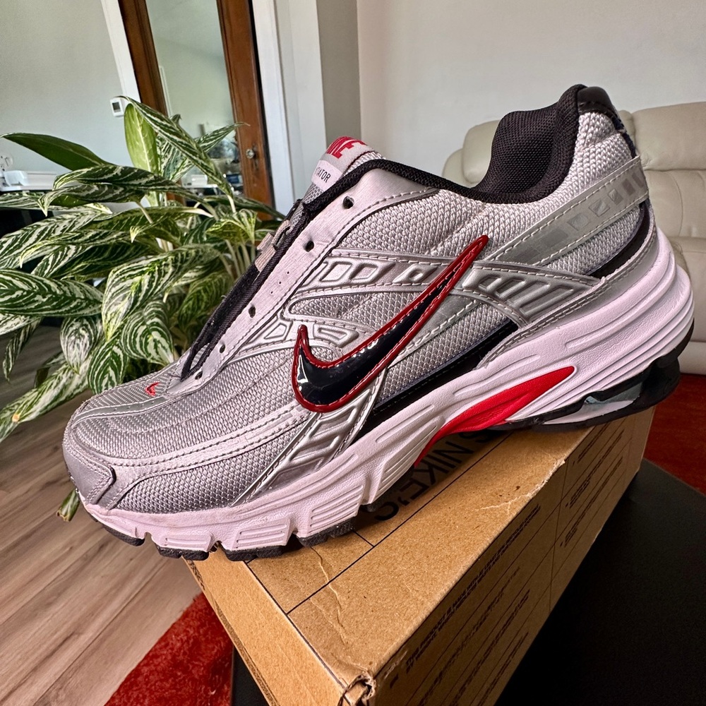 Nike Metallic Silver and Black Sneakers with Red Accents